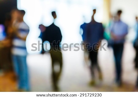 Abstract blurred people in press conference event, business concept