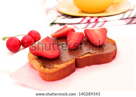 toast with chocolate paste and strawberry slices