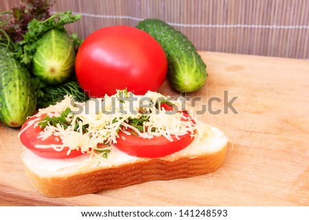 vegetarian sandwich with tomato and cheese