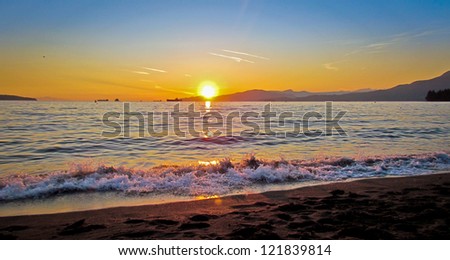 Beach Sunset - Photograph taken at English Bay in Vancouver, British Columbia, Canada.