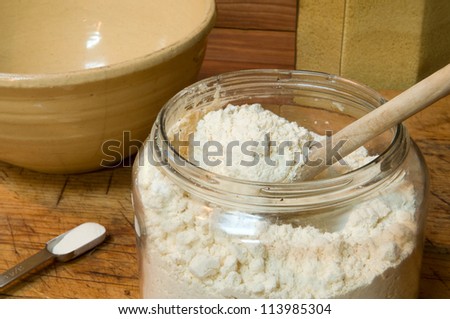 Gluten-free flour for baking, in an old jar with spoon: contains garbanzo bean, potato, tapioca, sorghum, and fava bean flours.  Also, 3/4 teaspoon xanthan gum - important for gluten-free baking.