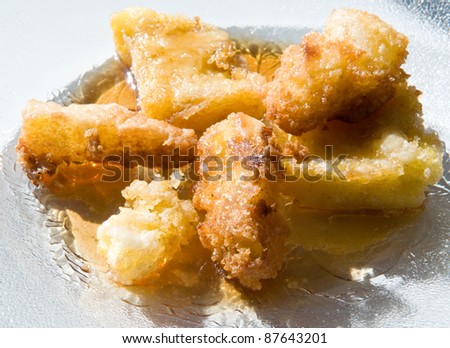 Fried corn meal mush with maple syrup - a traditional country and soul food dish in the U.S., Latin America, and elsewhere