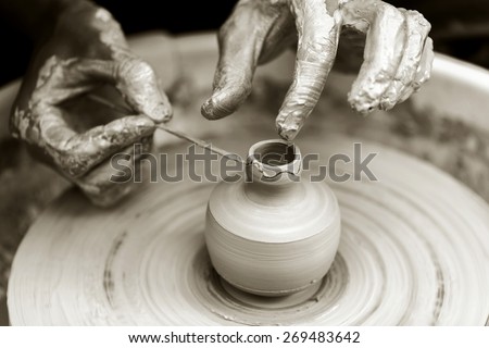 Similar – Image, Stock Photo Woman making ceramic work with potter’s wheel