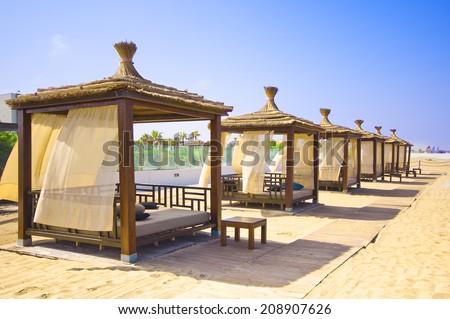 AGADIR, MOROCCO - JUL 08, 2014: Relax chairs at Hotel Sofitel Agadir Royalbay Resort is located in the magnificent beach of Atlantic ocean with golden sand and imbued  the spirit of modern luxury