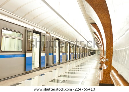 MOSCOW, RUSSIA - SEPTEMBER 26, 2014: Train at platform in Metro station Park Pobedy in Moscow, Russia. Station Park Pobedy was opened 06 May 2003
