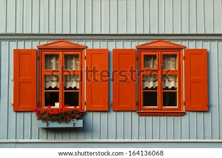 Two old red windows, Open-air Museum in Lodz, Poland
