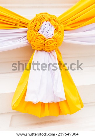 Big bow of yellow ribbon.