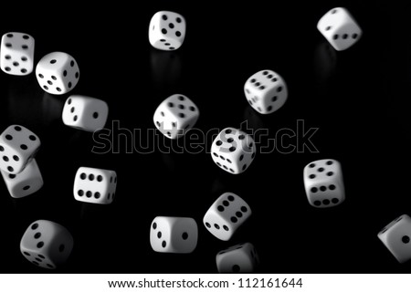 White Dice Rolling On A Black Background Stock Photo 112161644 ...