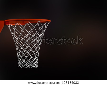 Basketball basket in arena with white nets on black background.