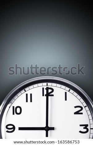 Time concept. Close up view of clock on wall with copy space, time to work.
