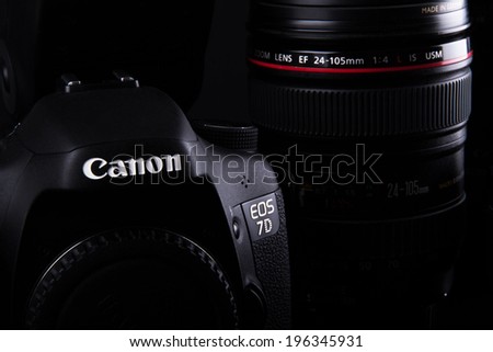ISTANBUL, TURKEY - JANUARY 04, 2014: Photo of Canon containing 7D body and  24-105mm zoom lens on dark background.