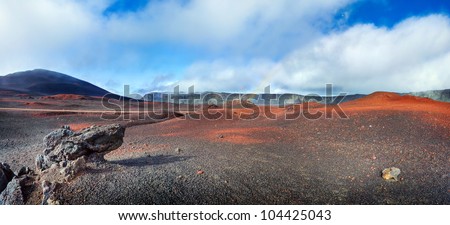 Panoramic scenic view of volcanic landscape, Plaine des Sables on Reunion Island.