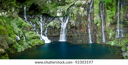 The Langevin Waterfall at Reunion Island and a pool of blue water.