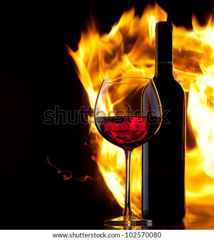 Red wine. Concept with fire.