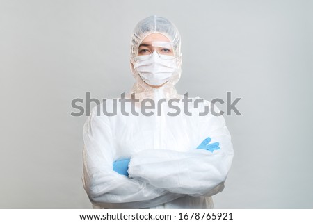 Similar – Image, Stock Photo doctor man wearing protective mask and gloves indoors. Holding an alcohol gel or antibacterial disinfectant. Hygiene and corona virus concept. Covid-19