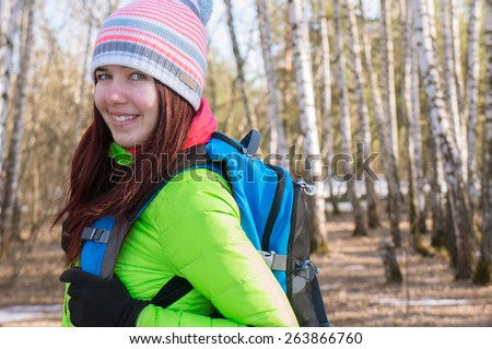 Close up portrait of woman hiking in the forest