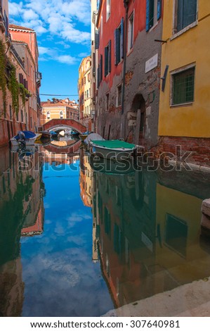 Beautiful street and canal in Venice, Italy.