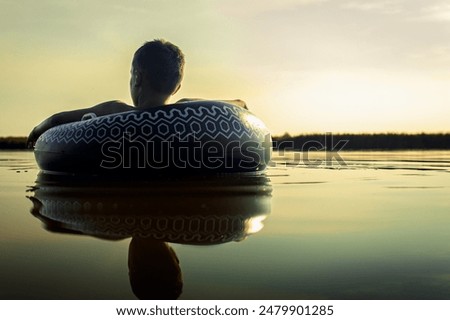 Similar – Image, Stock Photo Rubber ring on pier near lake