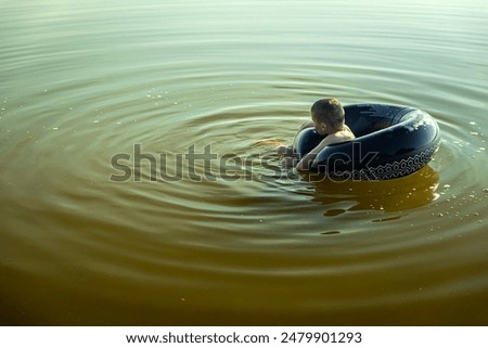 Similar – Image, Stock Photo Rubber ring on pier near lake