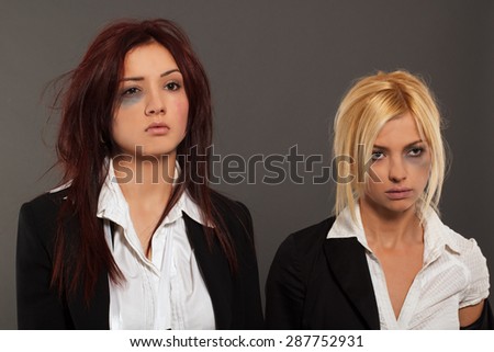 Portrait of two business woman after fight for job interview