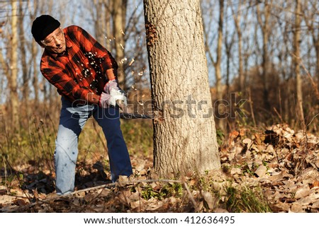 Similar – Image, Stock Photo Senior man cutting logs, working in the garden