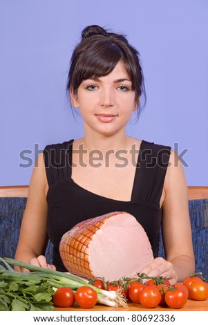 Young woman with ham and vegetable