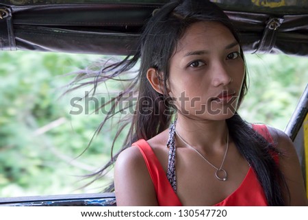 woman riding in a pick up