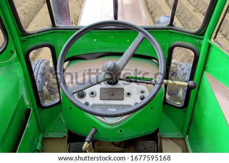 Similar – Image, Stock Photo Tractor steering wheel