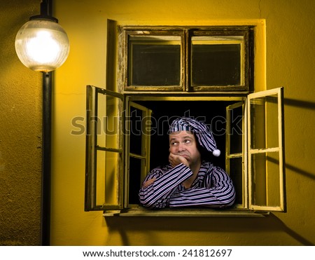 sleepy man in the window
