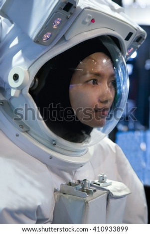 Similar – Image, Stock Photo Asian cosmonaut looking at camera in studio