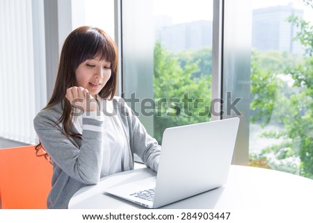 Asian woman with laptop