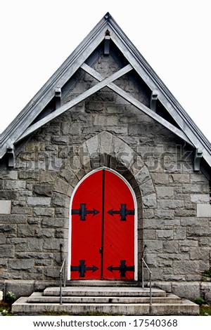 stone building face with red door