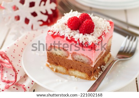 A Piece of No Bake Layer Cake (Savoiardi Soaked in Raspberry Liqueur, Chocolate Mousse, Raspberry Mousse and Raspberry Jelly), Christmas Atmosphere