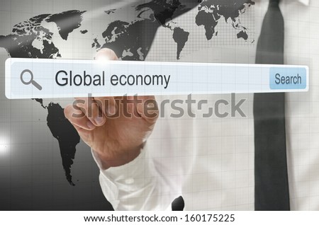 Global economy written in search bar on virtual screen. Elements of this image furnished by NASA.