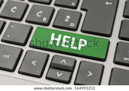 Green help button on computer keyboard.