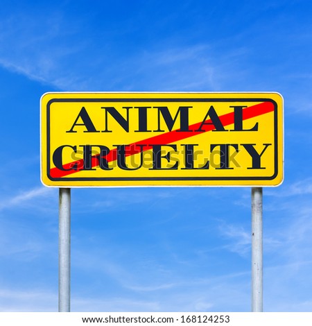 Animal cruelty written on yellow street sign and crossed off. Stop animal cruelty concept.