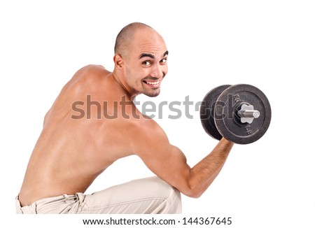 Strong man lifting weights.  Happy bodybuilder training hard with heavy dumbbells. Isolated on white.