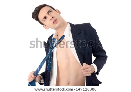 Young business man undressing his suit, pulling his tie. Business is over, the stress is too much concept.