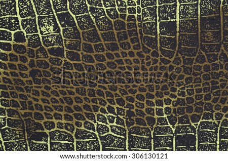 Snake skin pattern on fabric. Close up on black and green snake skin print for background.