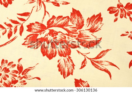 Floral pattern on white fabric. Graphic big red flower print as background.