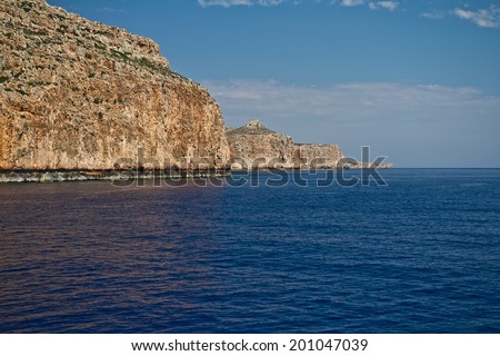The Greek island of Crete in the Mediterranean sea. Rocky shore of the sea