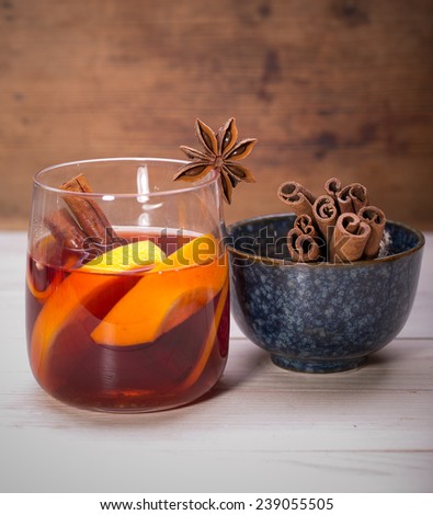 Hot Christmas tea with cinnamon, cardamom, cloves, anise and orange