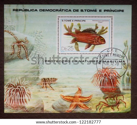 SANTOMEAN - CIRCA 1979: A stamp printed in Santomean shows a red fish with starfishes unDer the sea, circa 1979.