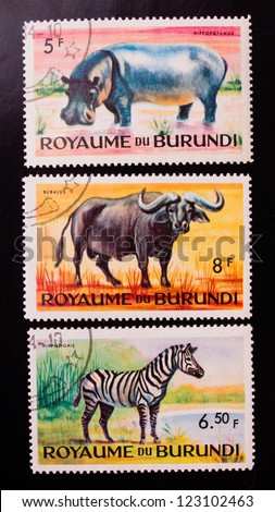 BURUNDI - CIRCA 1970: A stamp printed in Burundi shows three kinds of animals from the hot countries , circa 1970.