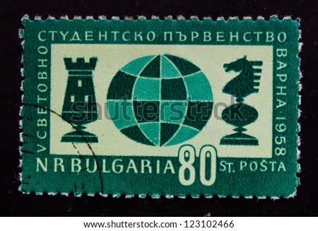 BULGARIA- CIRCA 1958: A stamp printed in Bulgaria shows the game of chess with horse and boat, circa 1958.