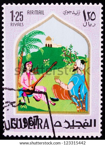 FUJAIRAH - CIRCA 1967: A stamp printed in Fujairah shows the image of a singing woman from the story of Ali Baba , circa 1967.