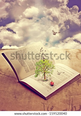 Tree of knowledge in opened book
