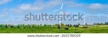 Similar – Image, Stock Photo Windmill at the lower edge of the picture in silhouette form and sky with contrails