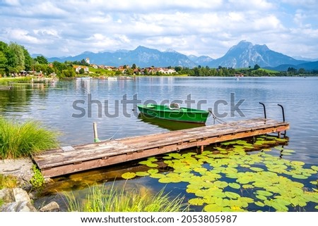 Similar – Foto Bild Bootssteg oder Badesteg aus schönem alten Holz im Sommer bei Sonnenschein am Alpsee in Schwangau bei Füssen im Allgäu im Freistaat Bayern