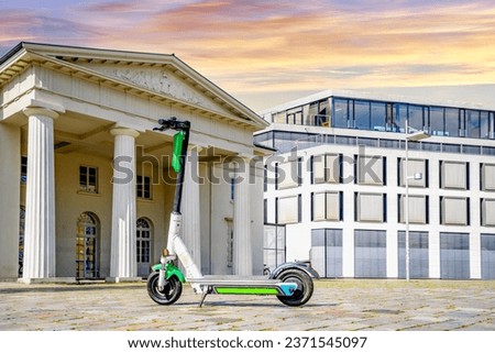 Similar – Image, Stock Photo Parking space for e-scooters and bicycles